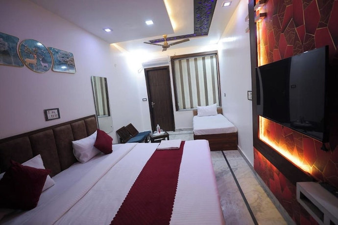Imagen de la habitación del Hotel Royal Taj Twin Palace near Taj Mahal. Foto 5