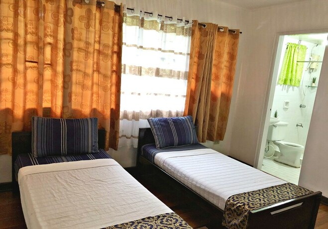 Imagen de la habitación del Hotel Royal Thee Bed and Breakfast. Foto 24