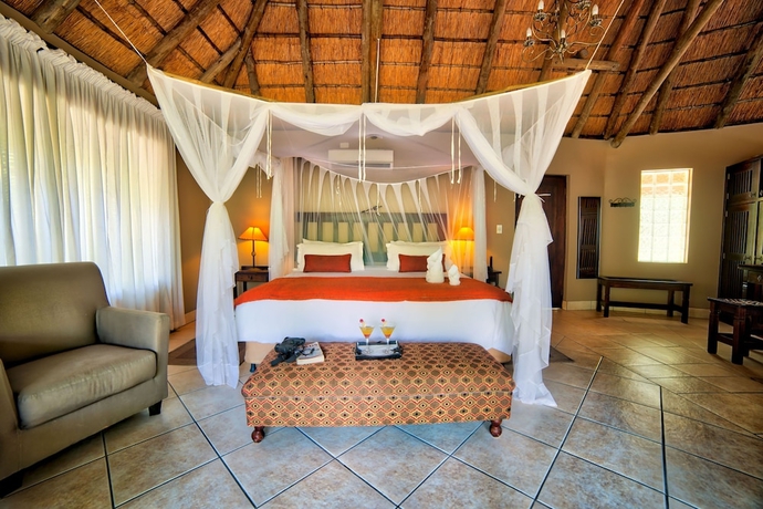 Imagen de la habitación del Hotel Royal Tree Lodge. Foto 6