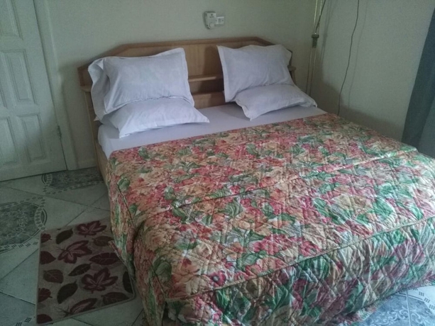 Imagen de la habitación del Hotel Royal Triangle Guest House. Foto 11