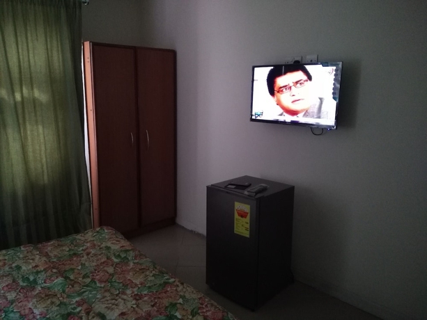 Imagen de la habitación del Hotel Royal Triangle Guest House. Foto 15