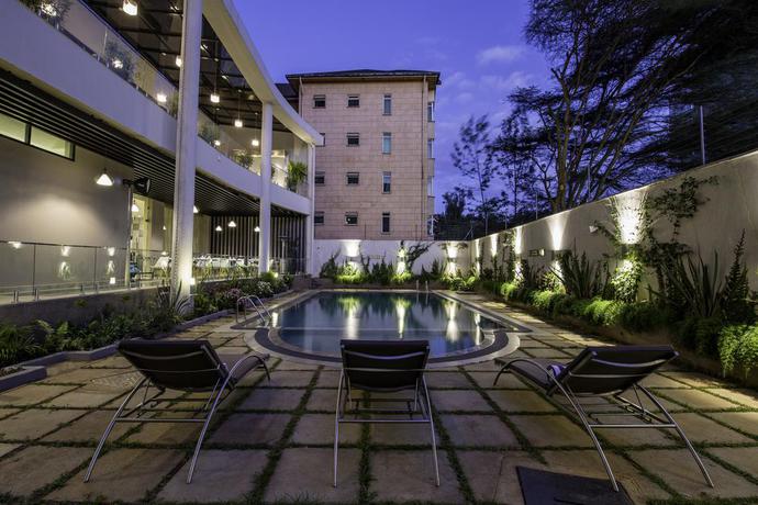 Imagen de la piscina del Hotel Royal Tulip Canaan Nairobi. Foto 14