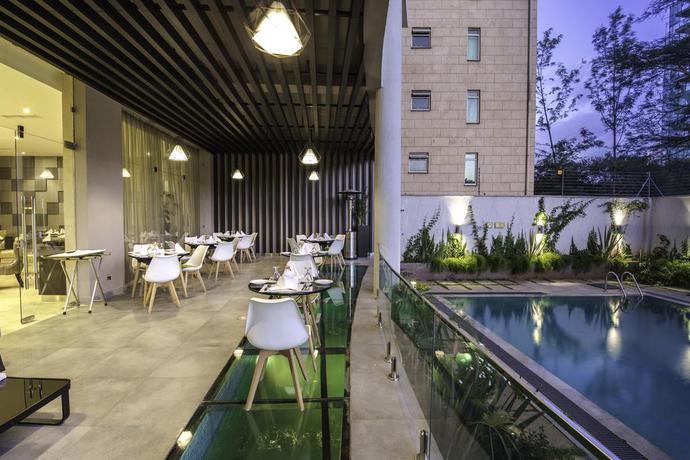 Imagen de la piscina del Hotel Royal Tulip Canaan Nairobi. Foto 15