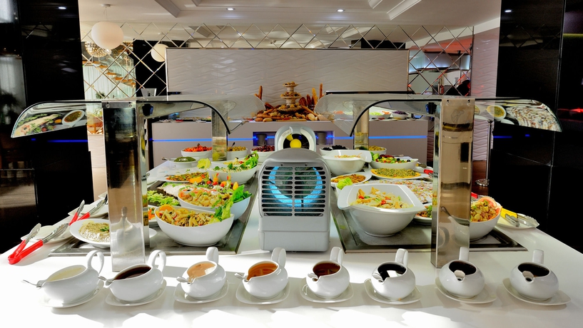 Imagen del bar/restaurante del Hotel Royal Tulip City Center Tanger. Foto 5