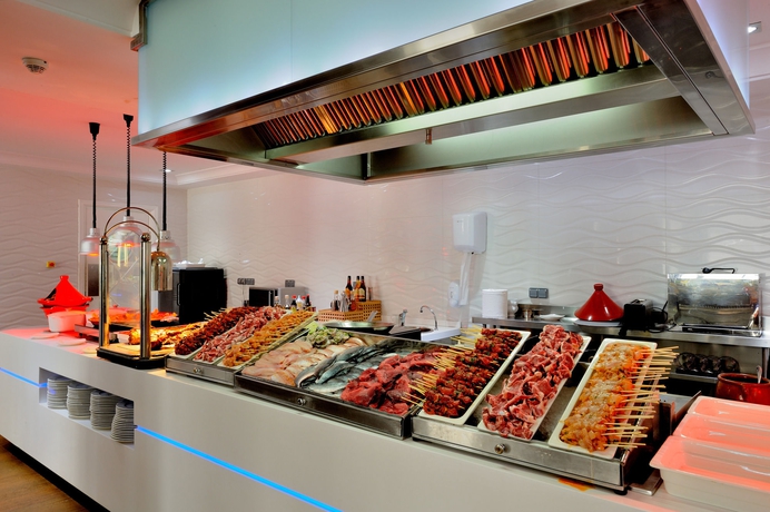 Imagen del bar/restaurante del Hotel Royal Tulip City Center Tanger. Foto 6