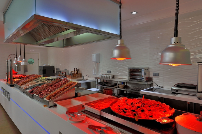 Imagen del bar/restaurante del Hotel Royal Tulip City Center Tanger. Foto 8