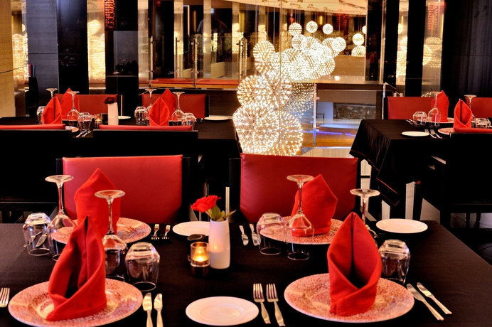 Imagen del bar/restaurante del Hotel Royal Tulip City Center Tanger. Foto 9