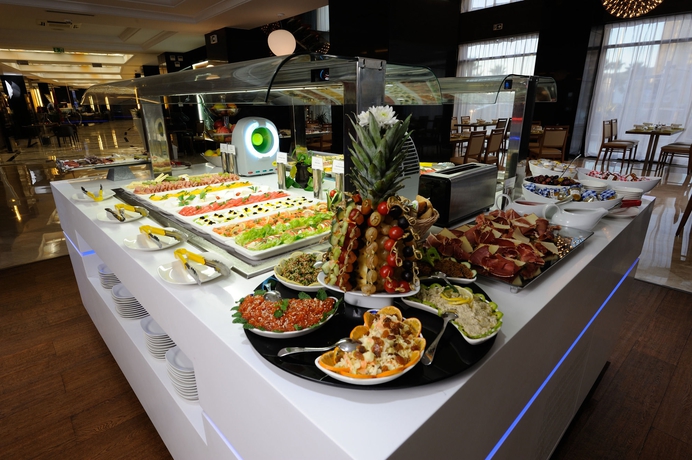 Imagen del bar/restaurante del Hotel Royal Tulip City Center Tanger. Foto 11