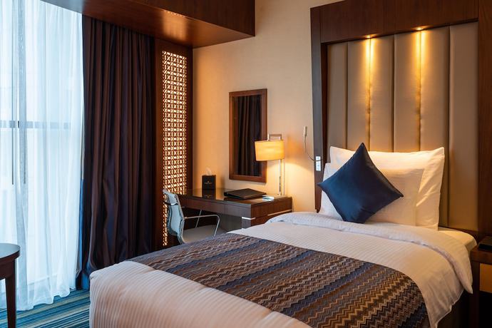 Imagen de la habitación del Hotel Royal Tulip Muscat. Foto 12