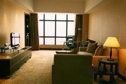 Imagen de la habitación del Hotel Royal Tulip On The Beach Shanghai. Foto 2