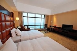 Imagen de la habitación del Hotel Royal Tulip On The Beach Shanghai. Foto 3