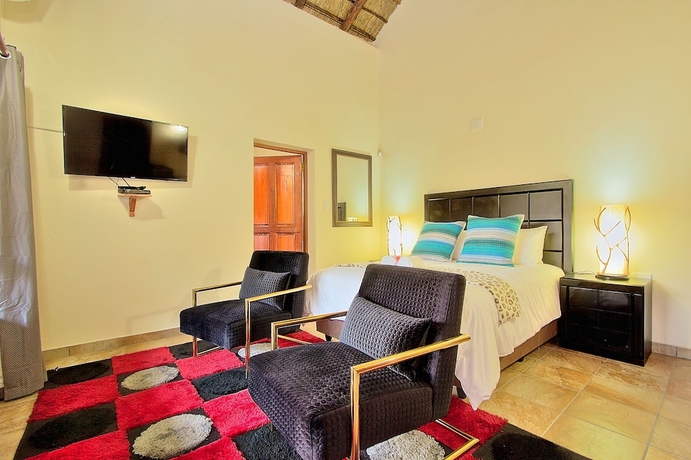 Imagen de la habitación del Hotel Royale Marlothi Safari Lodge. Foto 16