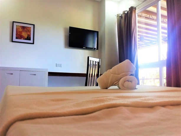 Imagen de la habitación del Hotel Royale Parc Puerto Princesa Palawan. Foto 13