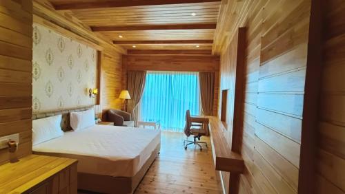 Imagen general del Hotel Royalpine Rosastays Kasauli. Foto 18
