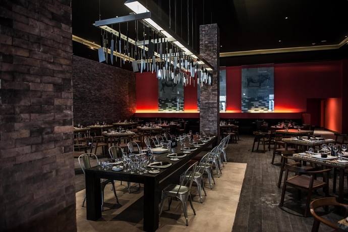 Imagen del bar/restaurante del Hotel Royalton Riviera Cancun, An Autograph Collection All-inclusive Resort and Casino. Foto 3