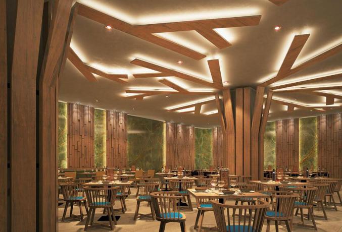 Imagen del bar/restaurante del Hotel Royalton Splash Riviera Cancun, An Autograph Collection All-inclusive Resort. Foto 3