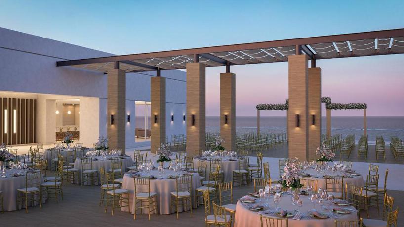 Imagen del bar/restaurante del Hotel Royalton Splash Riviera Cancun, An Autograph Collection All-inclusive Resort. Foto 4