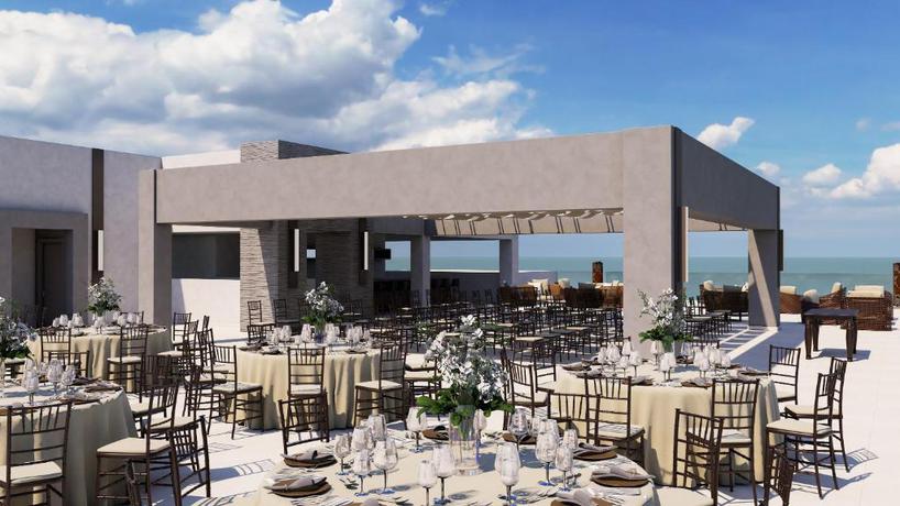 Imagen del bar/restaurante del Hotel Royalton Splash Riviera Cancun, An Autograph Collection All-inclusive Resort. Foto 5