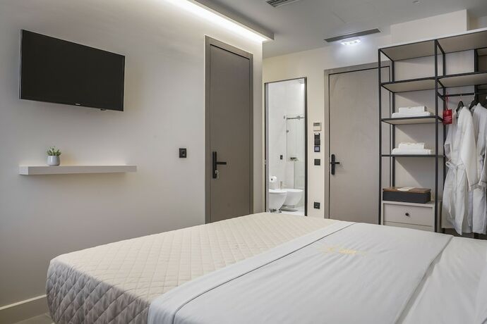 Imagen de la habitación del Hotel Royalty Athens. Foto 19