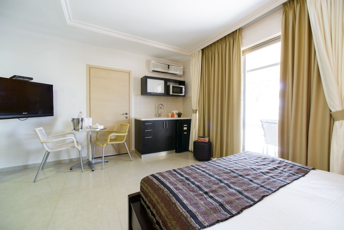 Imagen de la habitación del Hotel Royalty Suites. Foto 3