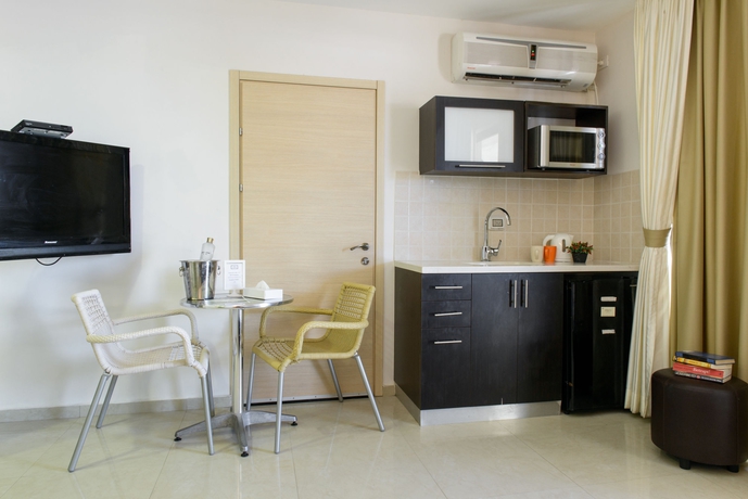 Imagen de la habitación del Hotel Royalty Suites. Foto 4