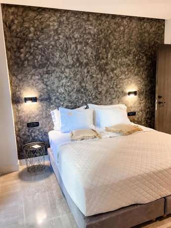 Imagen de la habitación del Hotel Royalty Suites Psyrri. Foto 6