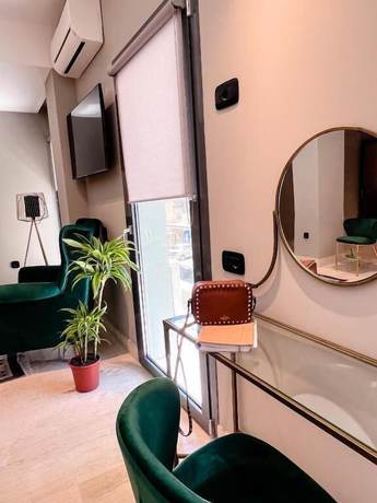 Imagen de la habitación del Hotel Royalty Suites Psyrri. Foto 19