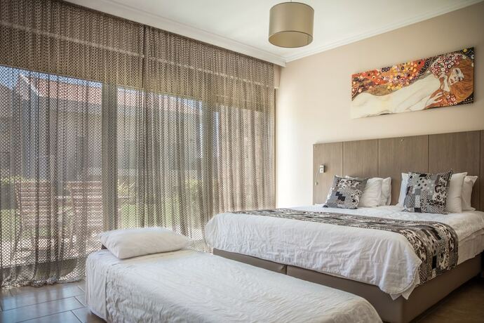 Imagen de la habitación del Hotel Royalty Suites Seaside. Foto 18