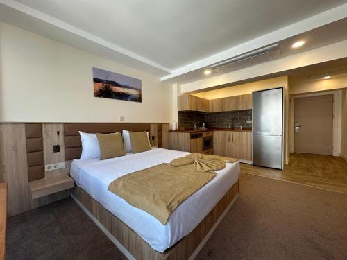 Imagen de la habitación del Hotel Roys & Suites. Foto 19