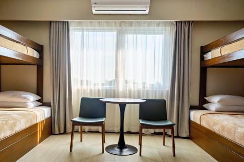Imagen general del Hotel Roy\'s and Convention Center. Foto 11