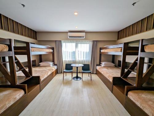 Imagen de la habitación del Hotel Roy\'s and Convention Center. Foto 19