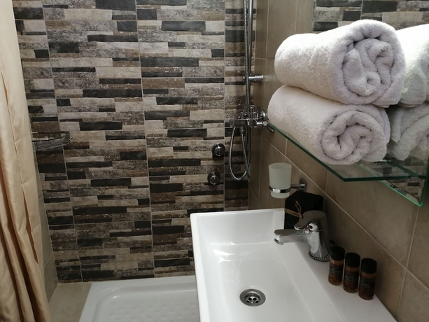 Imagen de la habitación del Hotel Roza Studios. Foto 11