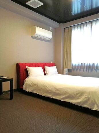 Imagen de la habitación del Hotel Rozy Namba. Foto 15