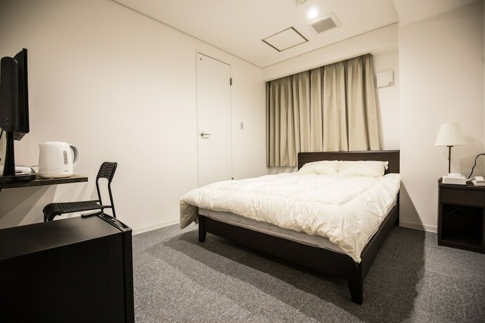 Imagen de la habitación del Hotel Rozy Namba. Foto 19