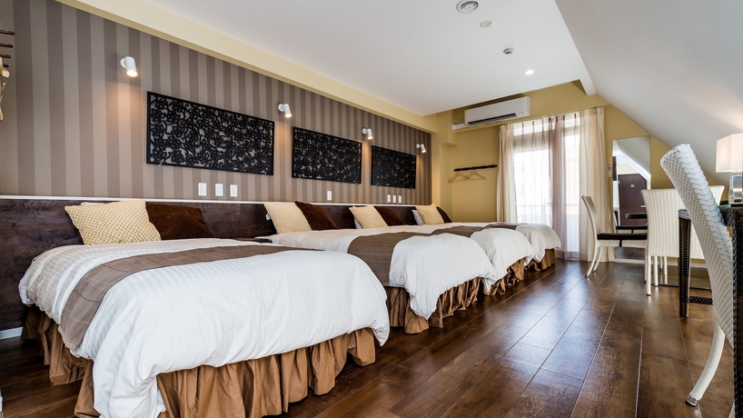 Imagen de la habitación del Hotel RozzZ STAY. Foto 9