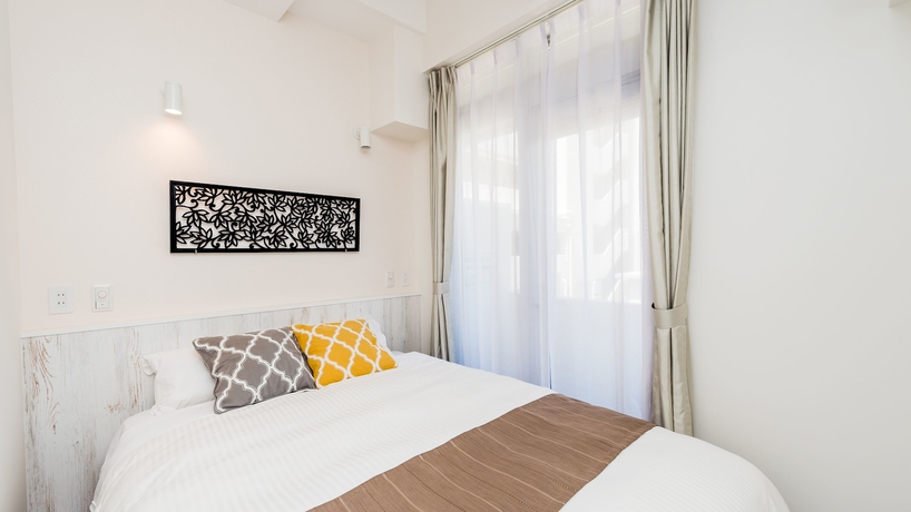 Imagen de la habitación del Hotel RozzZ STAY. Foto 12