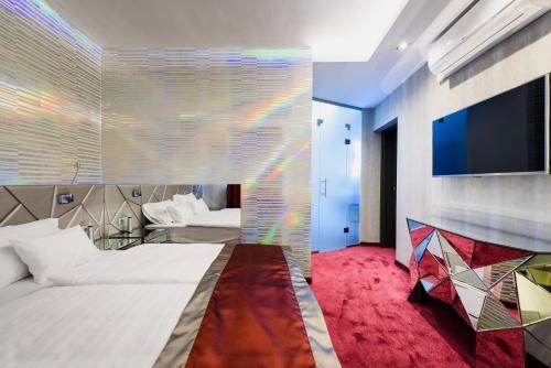 Imagen de la habitación del Hotel Rq Boutique & Unique. Foto 8