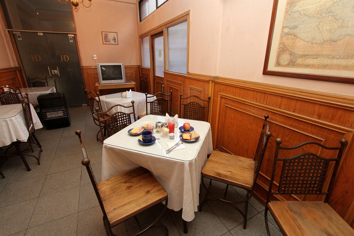 Imagen del bar/restaurante del Hotel Rq Da Carlo. Foto 3