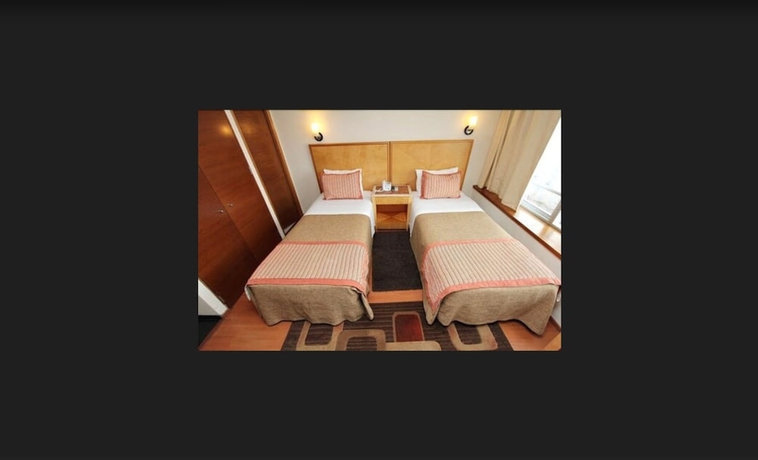 Imagen de la habitación del Hotel Rq Santiago. Foto 15