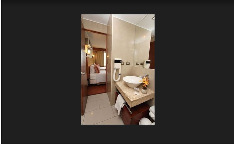 Imagen de la habitación del Hotel Rq Santiago. Foto 16