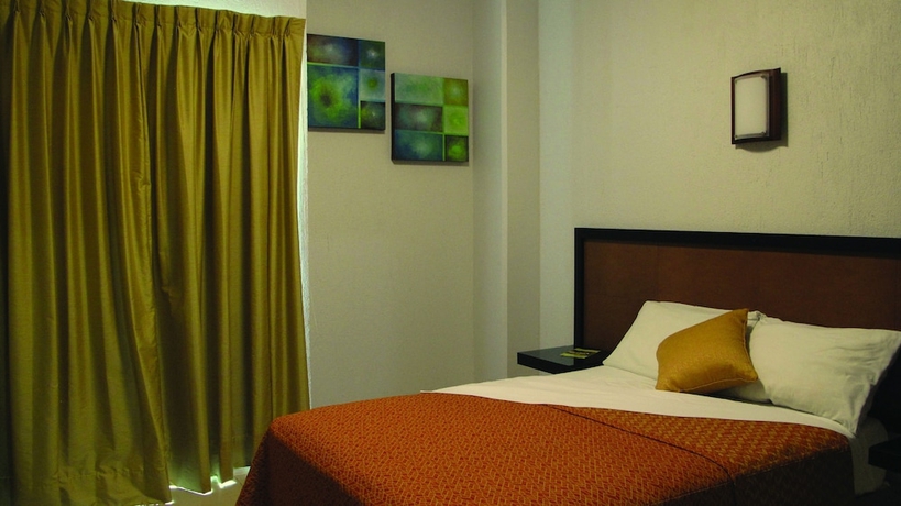 Imagen de la habitación del Hotel Rs Suites. Foto 3