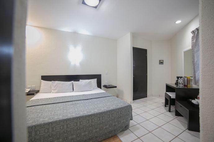 Imagen de la habitación del Hotel Rs Suites. Foto 12