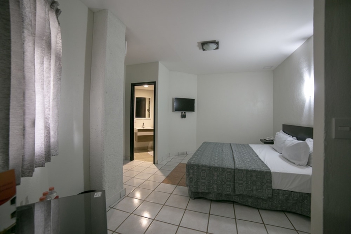 Imagen de la habitación del Hotel Rs Suites. Foto 13