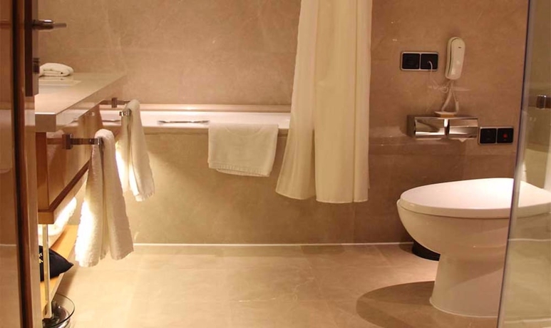 Imagen de la habitación del Hotel R-sun International Wuxi. Foto 16