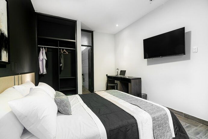 Imagen de la habitación del Hotel Rua Boutique. Foto 16