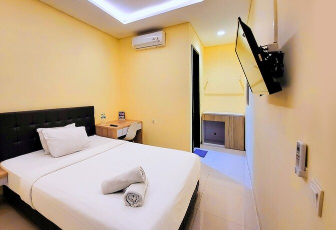 Imagen de la habitación del Hotel Ruang Nyaman at Regentown near ICE BSD. Foto 19