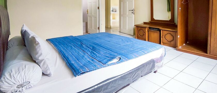 Imagen de la habitación del Hotel Ruang Nyaman at Sukanagalih Resort. Foto 13