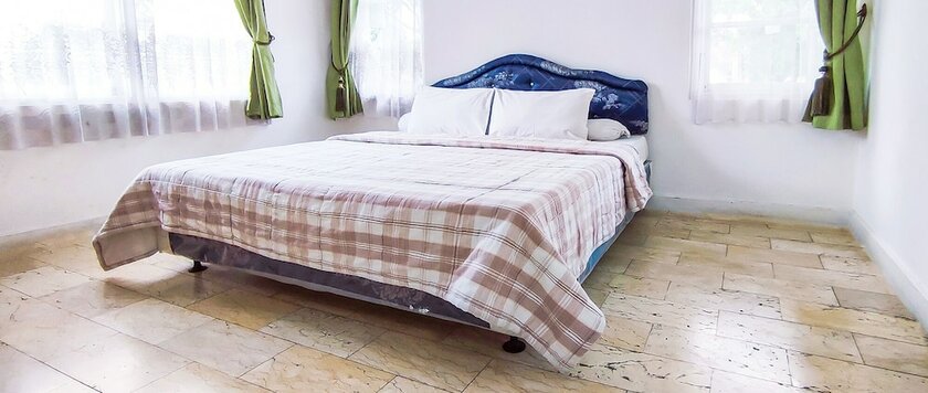 Imagen de la habitación del Hotel Ruang Nyaman at Sukanagalih Resort. Foto 14