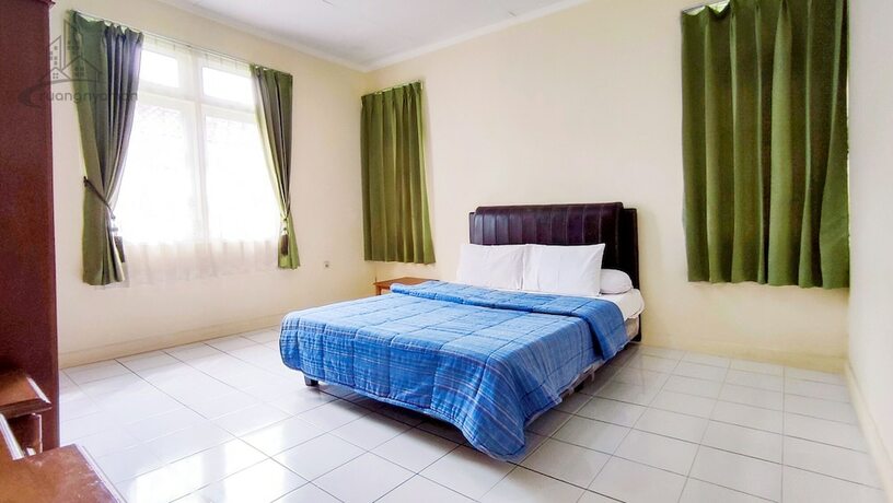 Imagen de la habitación del Hotel Ruang Nyaman at Sukanagalih Resort. Foto 17