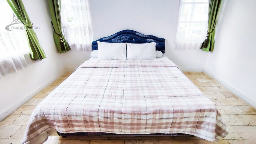 Imagen de la habitación del Hotel Ruang Nyaman at Sukanagalih Resort. Foto 20